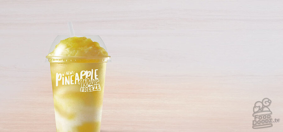 Taco Bell Pineapple Whip Freeze stock photo from their website
